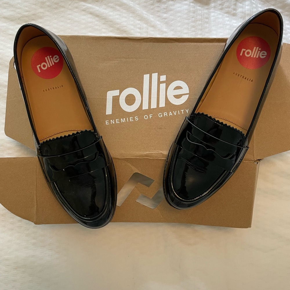 Black patent leather loafers.  Never worn by ROLLIES SIZE 40/ 9 womens NWT